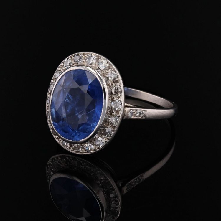 Oval Sapphire And Diamond Ring In Platinum