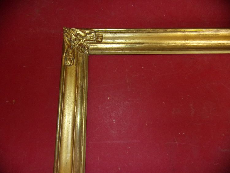 Cornice del XIX secolo in legno dorato.