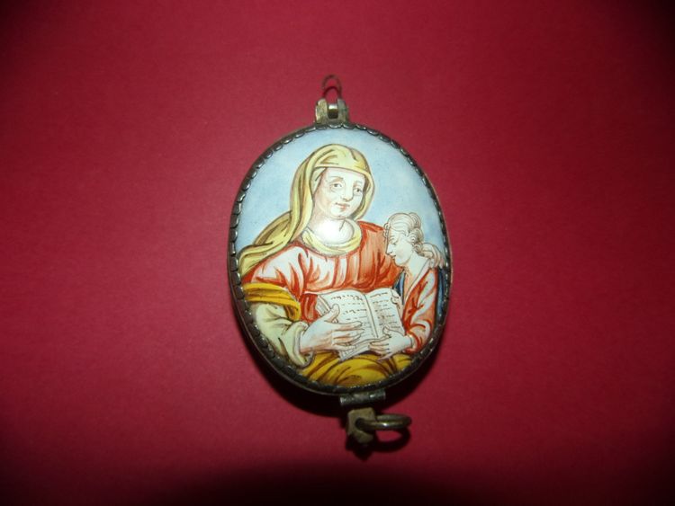 18th-century devotional reliquary with double painted enamel depicting Saint Peter and Saint Anne.