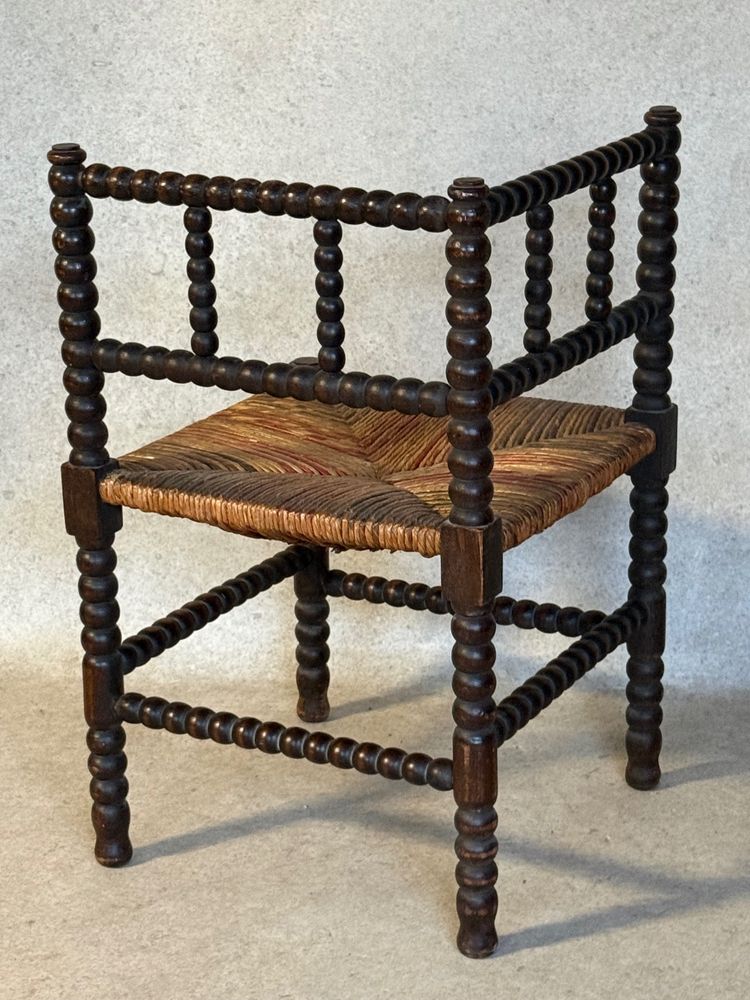 Fauteuil d’angle paillé