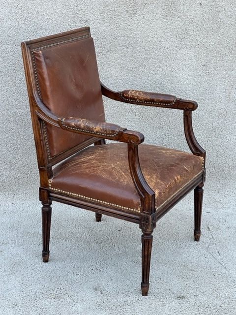 Worn leather office chair