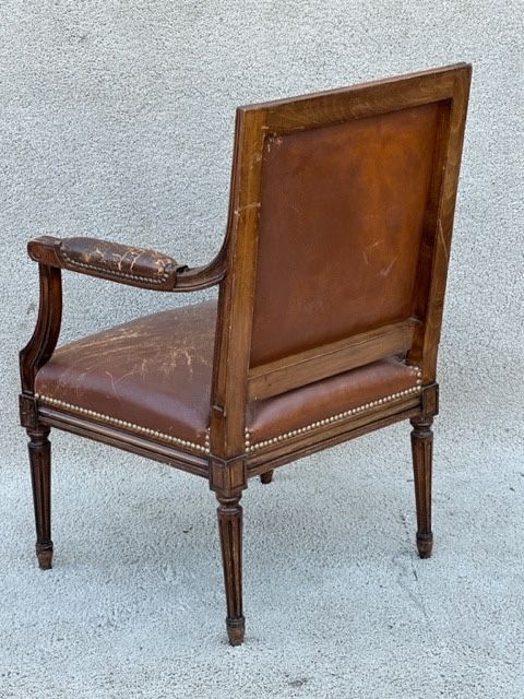 Worn leather office chair