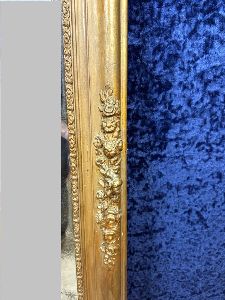Specchio in legno e stucco dorato in stile Impero, circa 1810-1820.