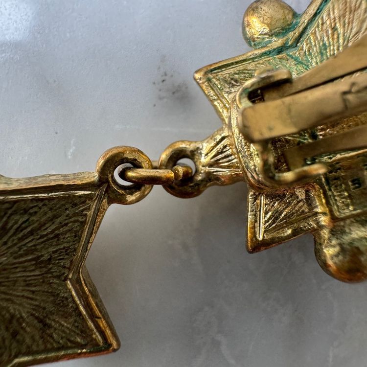 Coppia di orecchini Yves Saint Laurent a forma di stella