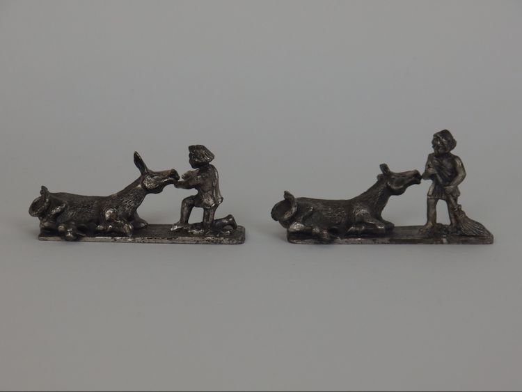 Suite de six portes couteaux Ane de Buridan