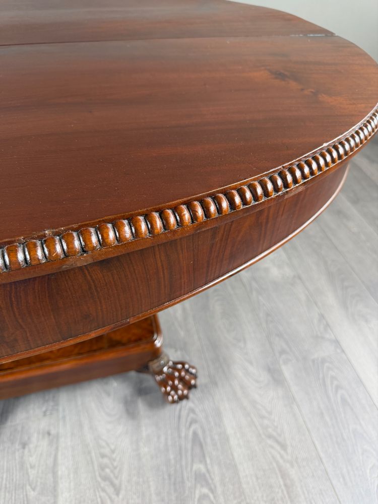 Table ovale de style Empire à pied central, XIXe siècle