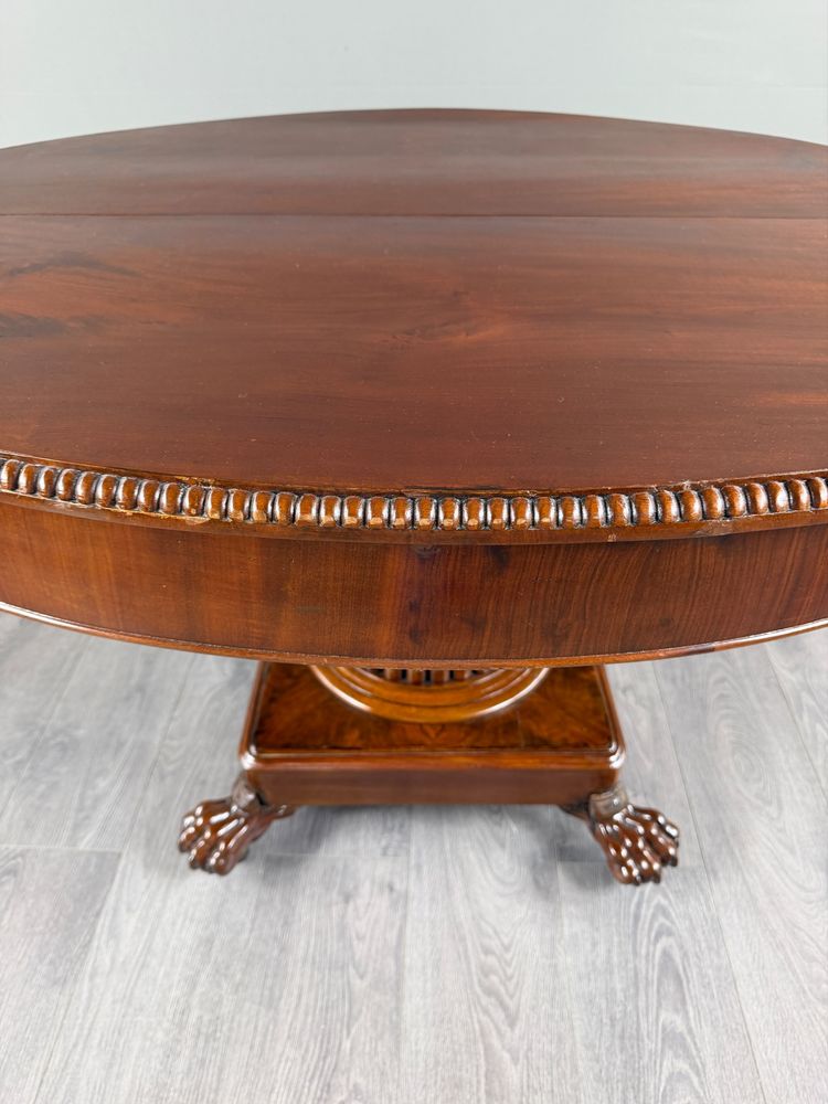 Table ovale de style Empire à pied central, XIXe siècle