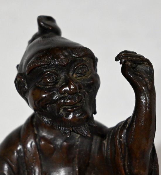 Personaggio cinese in bronzo e cane Fao, stile asiatico - inizio XX secolo