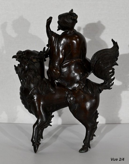 Personaggio cinese in bronzo e cane Fao, stile asiatico - inizio XX secolo