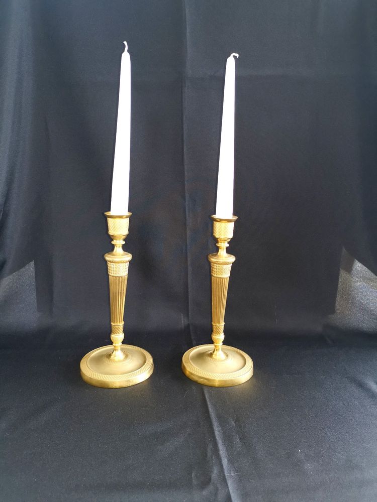 Rare paire de candélabres bougeoirs en bronze doré époque 1er Empire 1804-1815