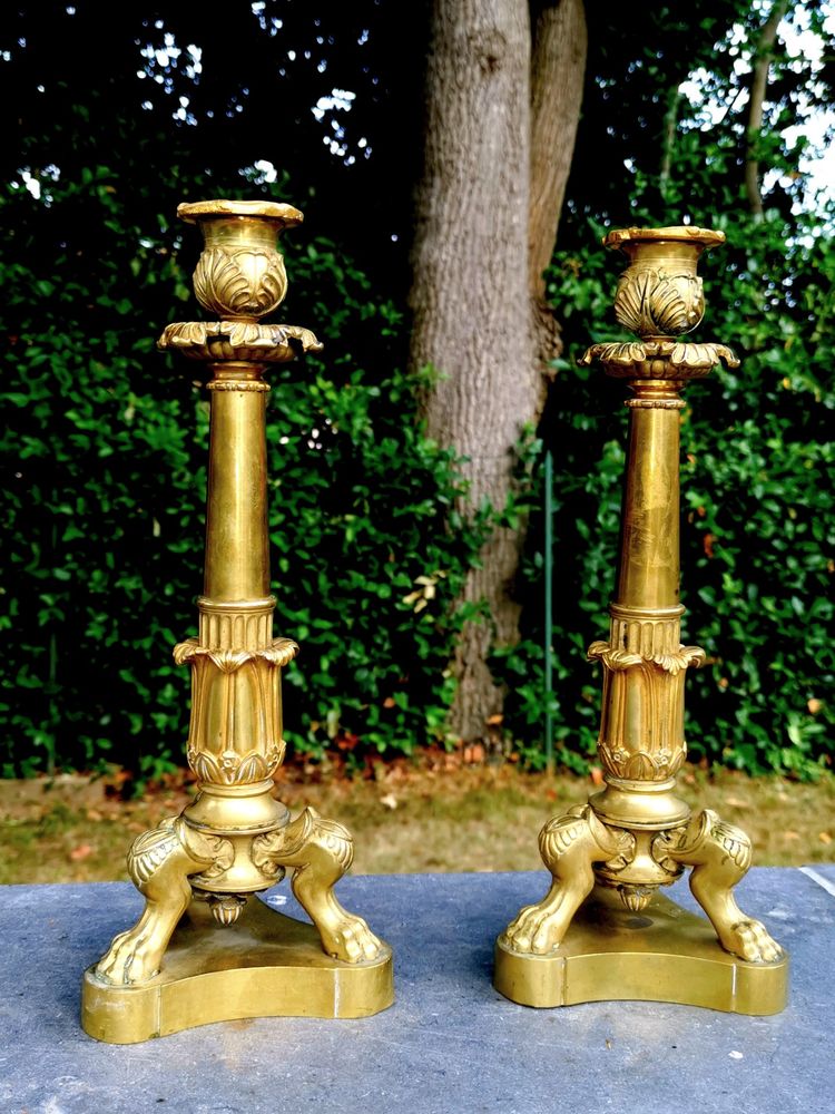 Paire de bougeoirs en bronze doré à pattes de lion XIX époque Restauration