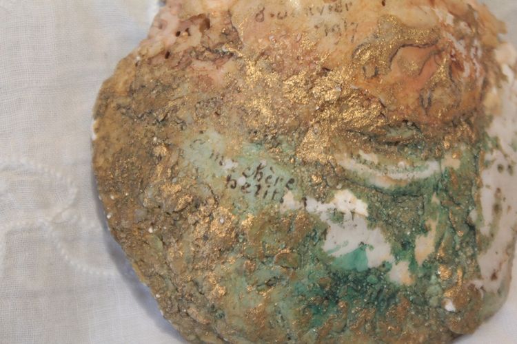 Painted seashell 'Venus and putto' dated 1917