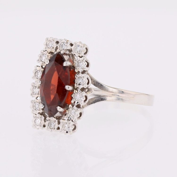 Vintage Ring With A Marquise-cut Garnet And Diamonds