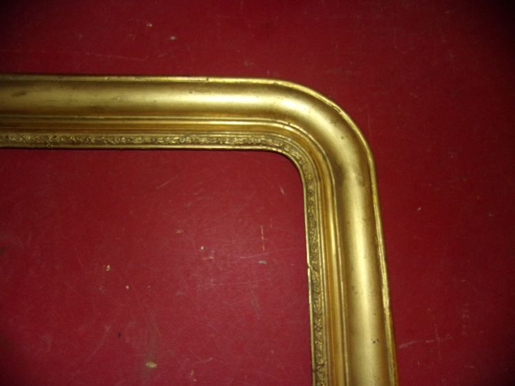 Cornice del XIX secolo in legno dorato.