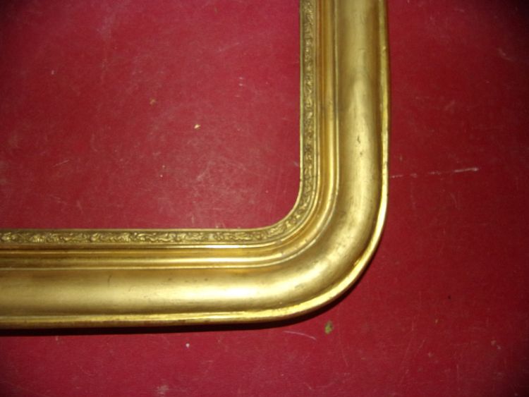 Cornice del XIX secolo in legno dorato.