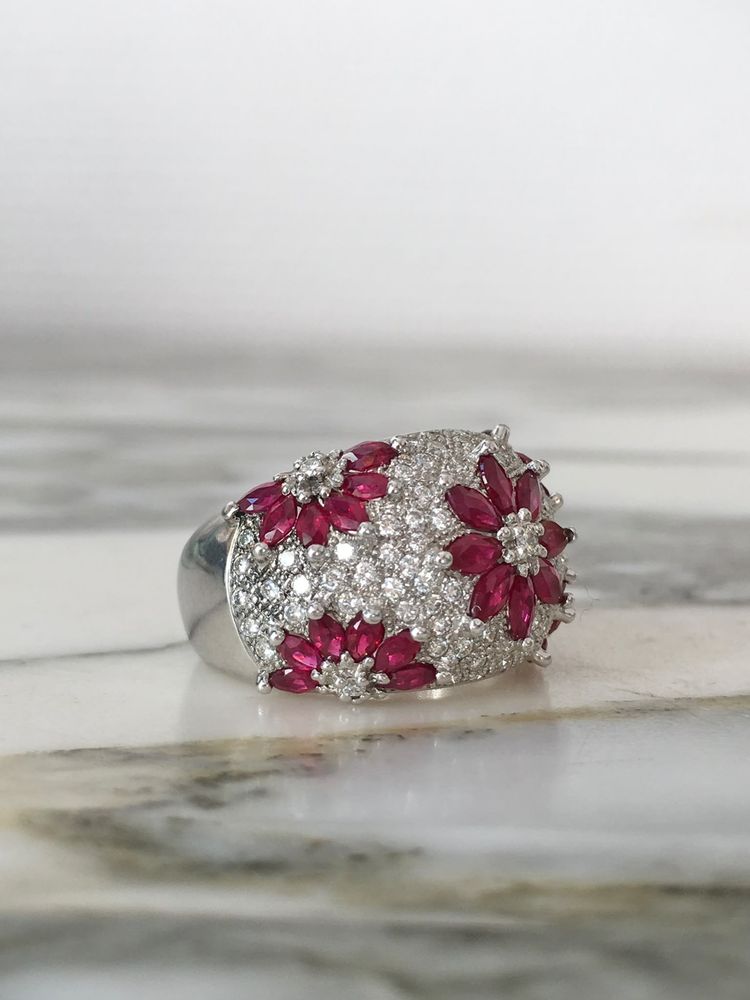Important 18K white gold dome ring with rubies and diamonds