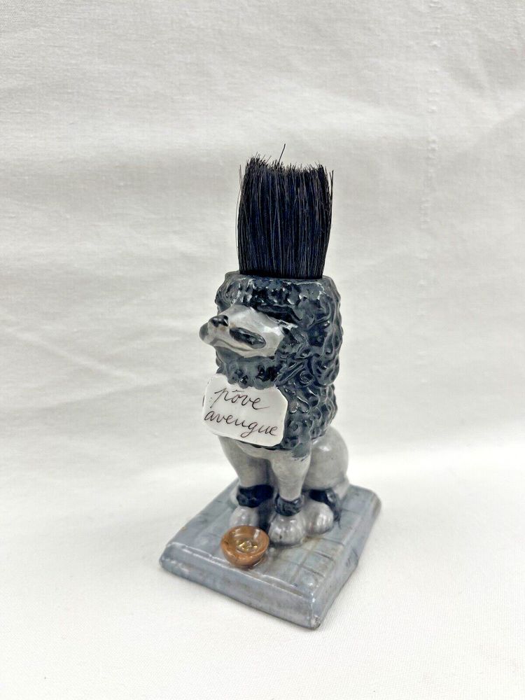 Porcelain pen holder, dog figurine