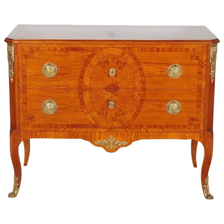 Commode Transition en placage d'acajou et citronnier, bronzes dorés, vers 1950