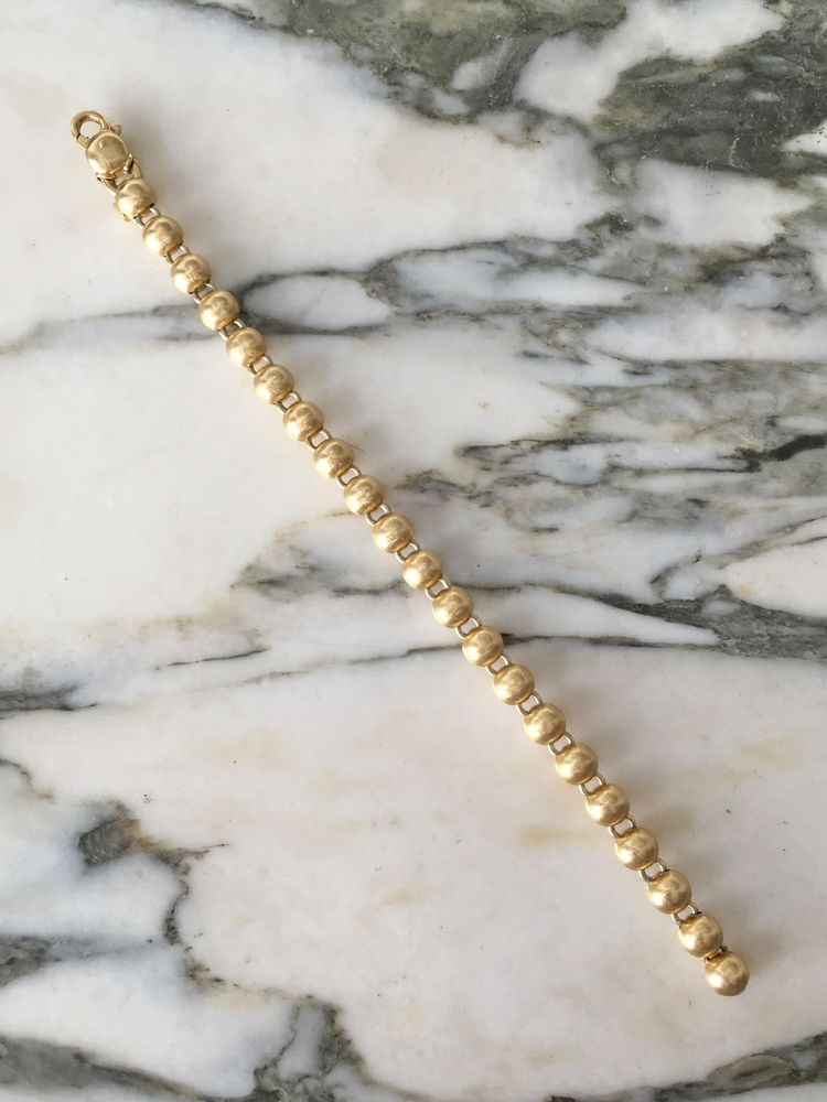 Bracciale con perline in oro giallo 18 carati