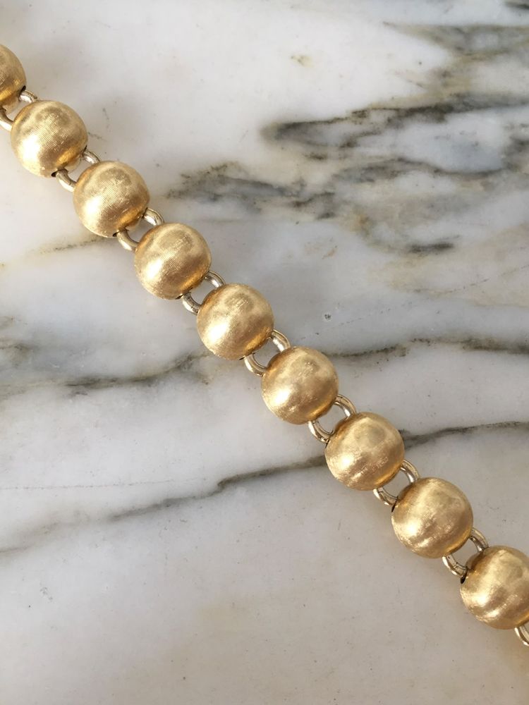 Bracciale con perline in oro giallo 18 carati