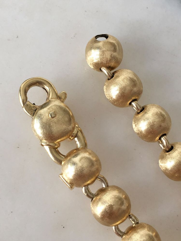 Bracciale con perline in oro giallo 18 carati