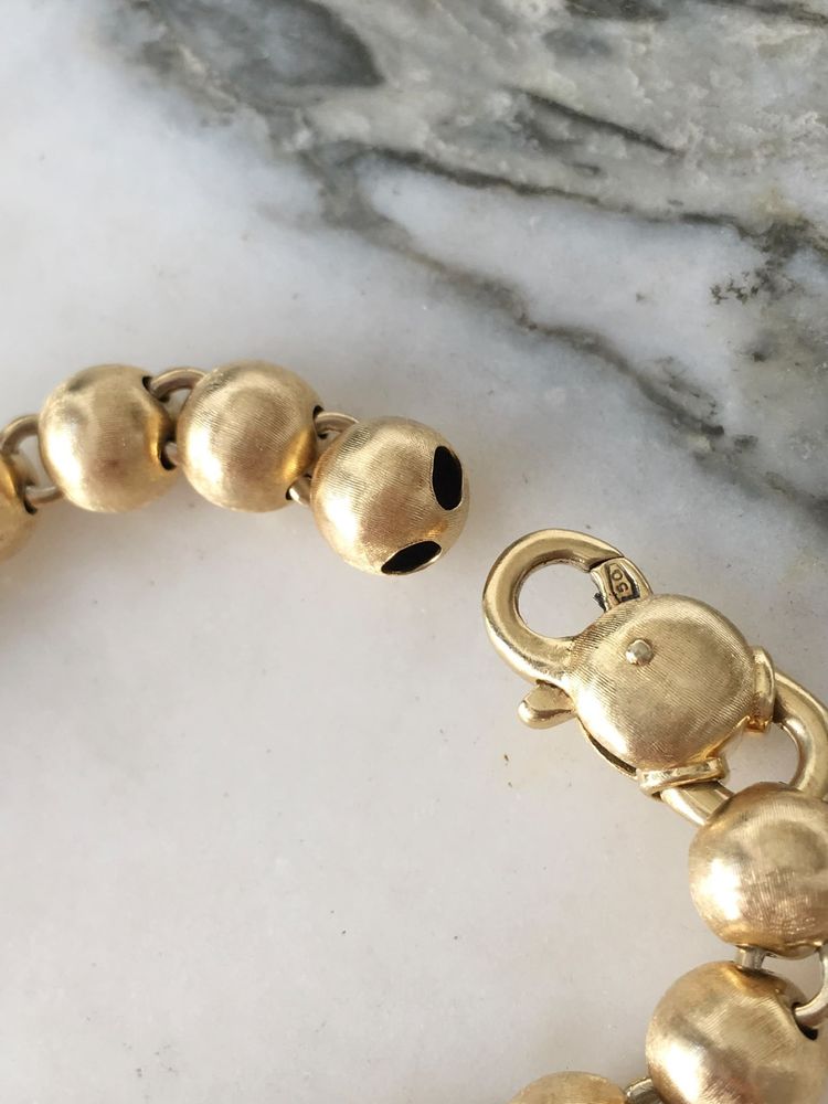 Bracciale con perline in oro giallo 18 carati