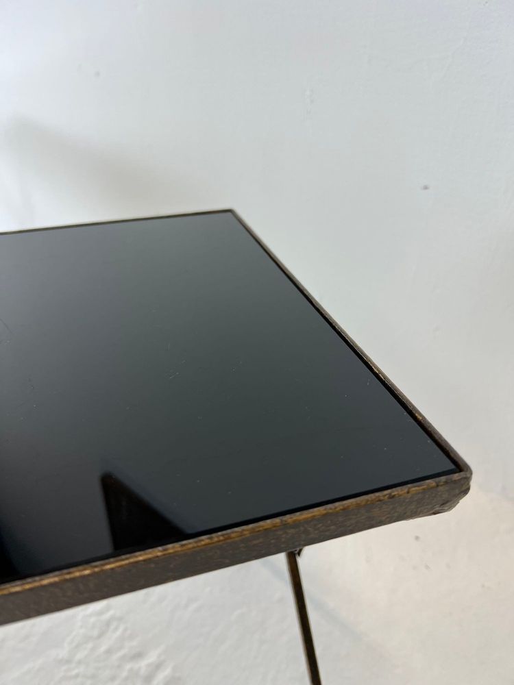 Modernist nesting tables made of metal and black glass, 1950s