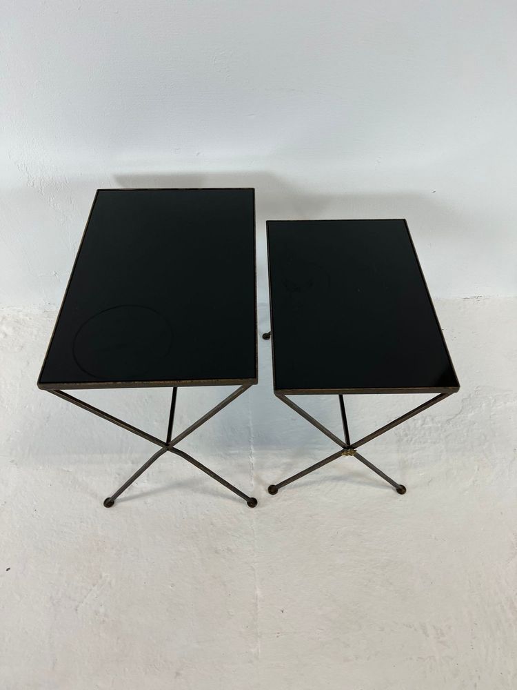 Modernist nesting tables made of metal and black glass, 1950s