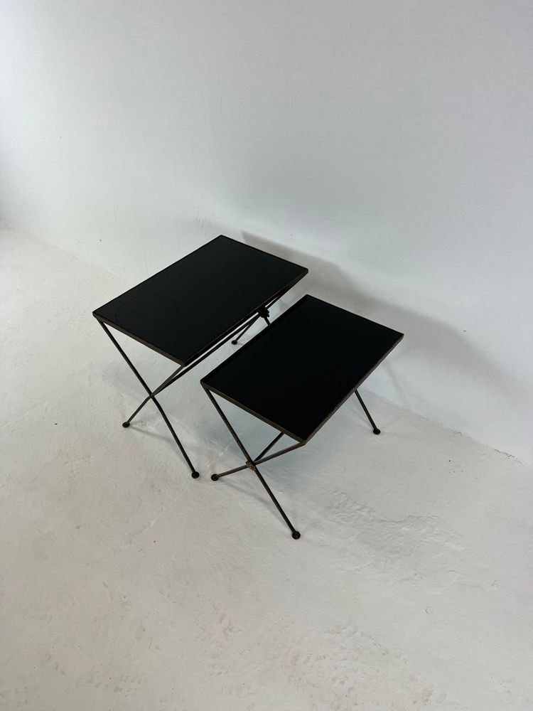 Modernist nesting tables made of metal and black glass, 1950s