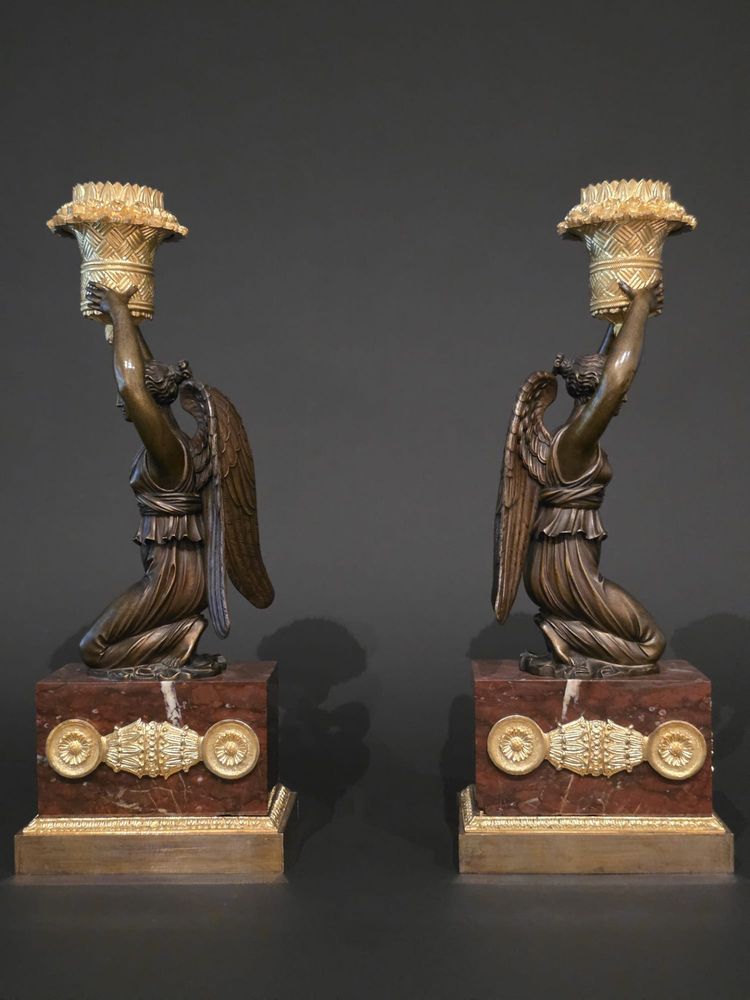 Pierre Chiboust, Pair of candlesticks signed with winged victory figures, Empire period.