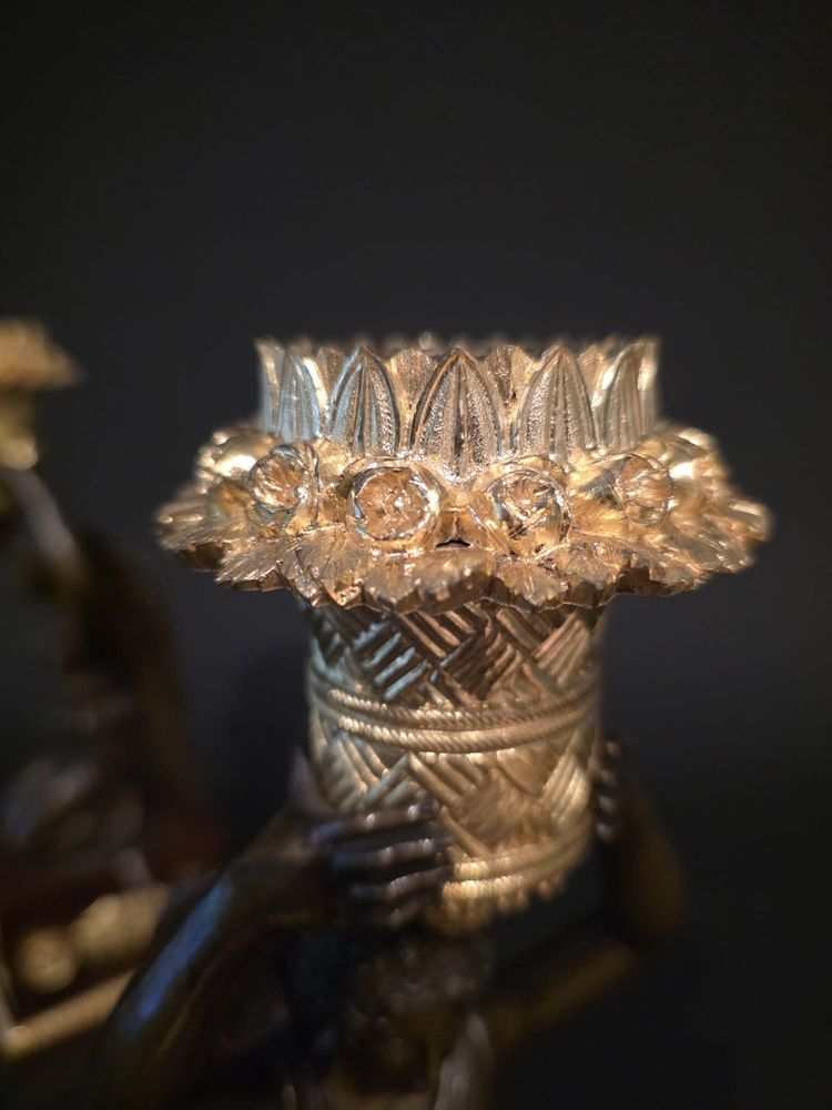 Pierre Chiboust, Pair of candlesticks signed with winged victory figures, Empire period.
