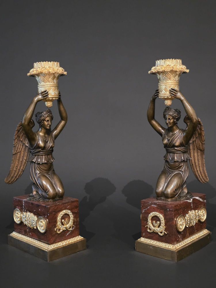 Pierre Chiboust, Pair of candlesticks signed with winged victory figures, Empire period.