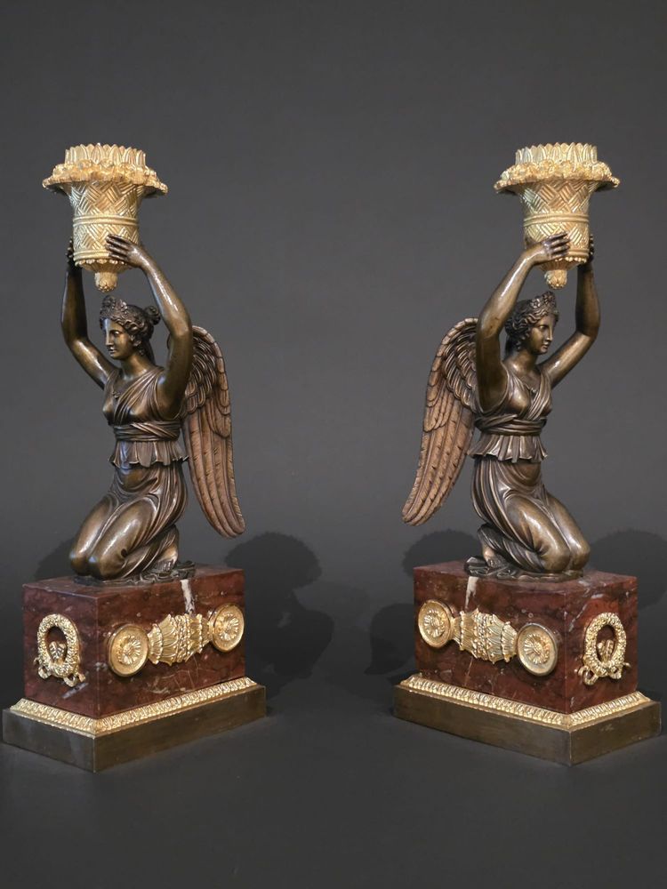 Pierre Chiboust, Pair of candlesticks signed with winged victory figures, Empire period.