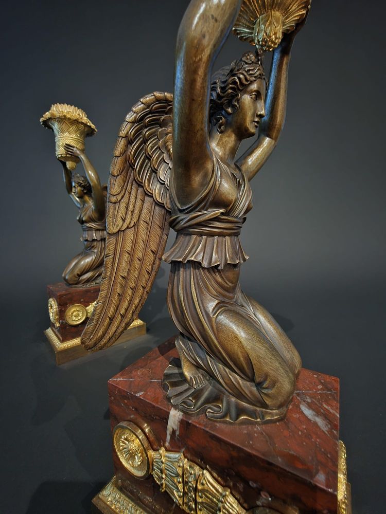 Pierre Chiboust, Pair of candlesticks signed with winged victory figures, Empire period.