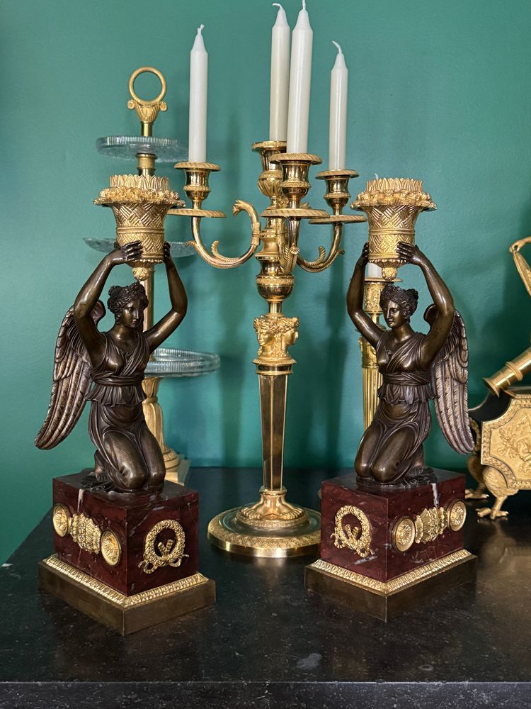 Pierre Chiboust, Pair of candlesticks signed with winged victory figures, Empire period.