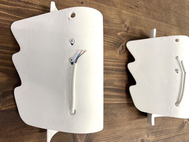 Pair of ceramic wall sconces, circa 1990