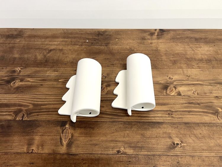 Pair of ceramic wall sconces, circa 1990