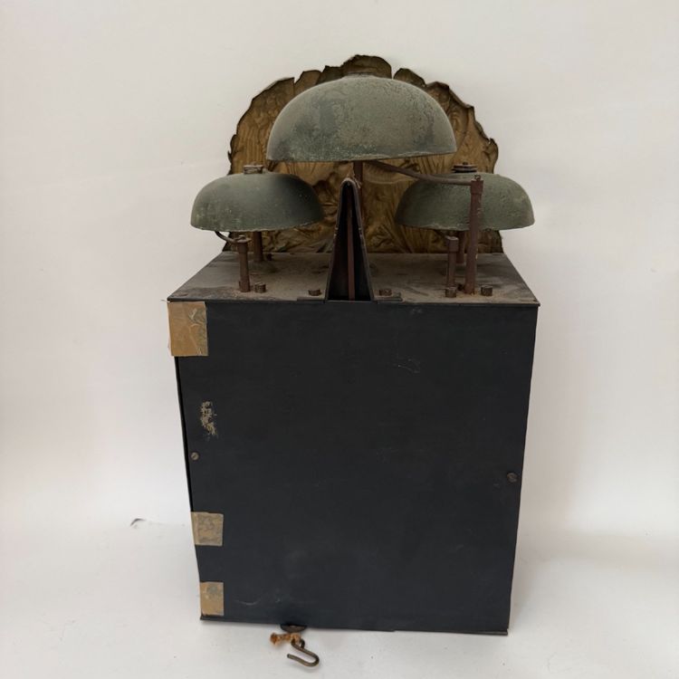 Comtoise clock movement with three bells and a brass pediment