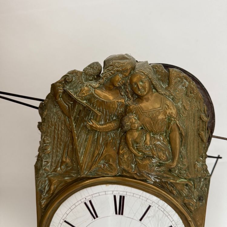 Comtoise clock movement with three bells and a brass pediment