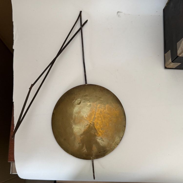 Comtoise clock movement with three bells and a brass pediment