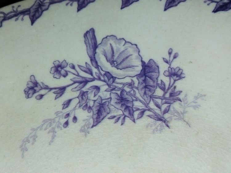 GIEN CUP on a Flat Footed Antique Faience Cookie Plate with Floral and Purple Bird Motif, "LISERONS" Model