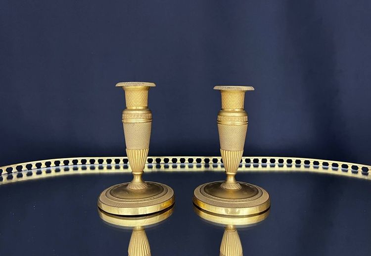 Pair of gilded brass candlesticks, Empire style
