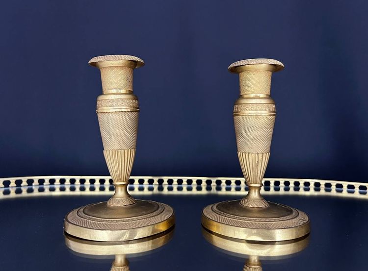 Pair of gilded brass candlesticks, Empire style