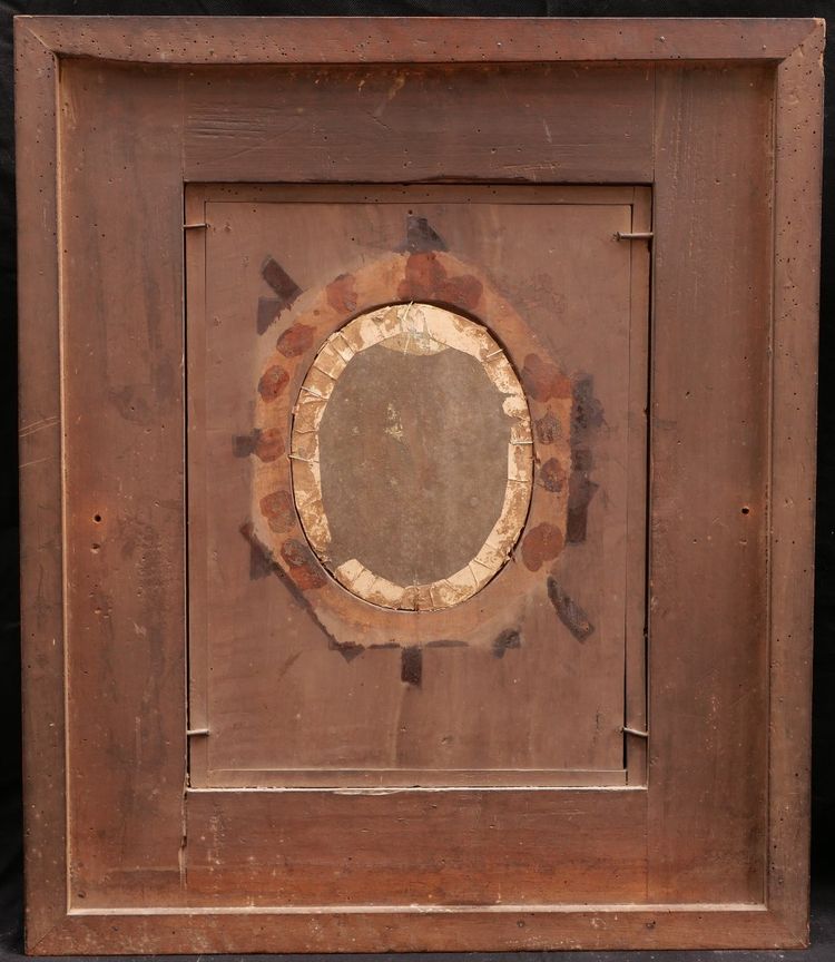 Richly carved, stained fruitwood oval picture frame, 19th century
