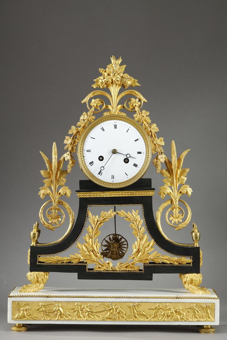 LARGE DIRECTOIRE CLOCK IN PATINATED AND GILT BRONZE