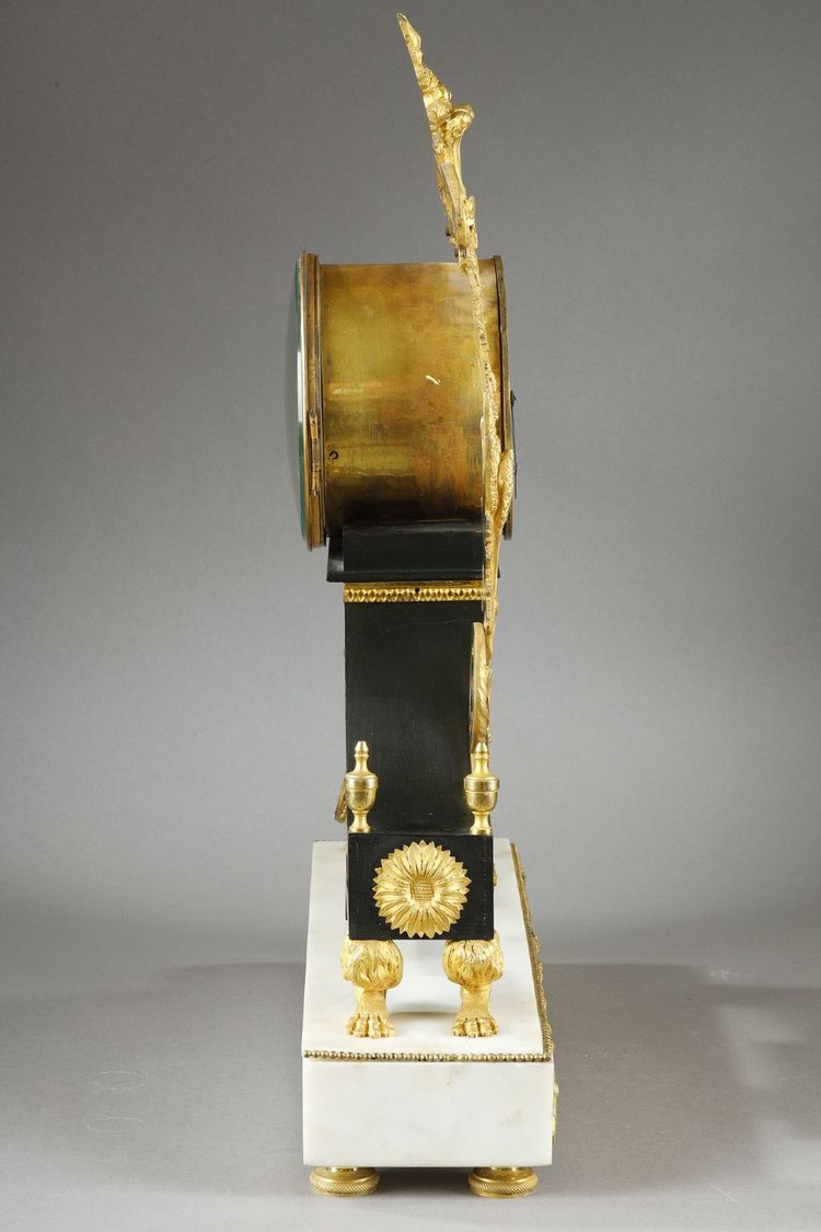 LARGE DIRECTOIRE CLOCK IN PATINATED AND GILT BRONZE