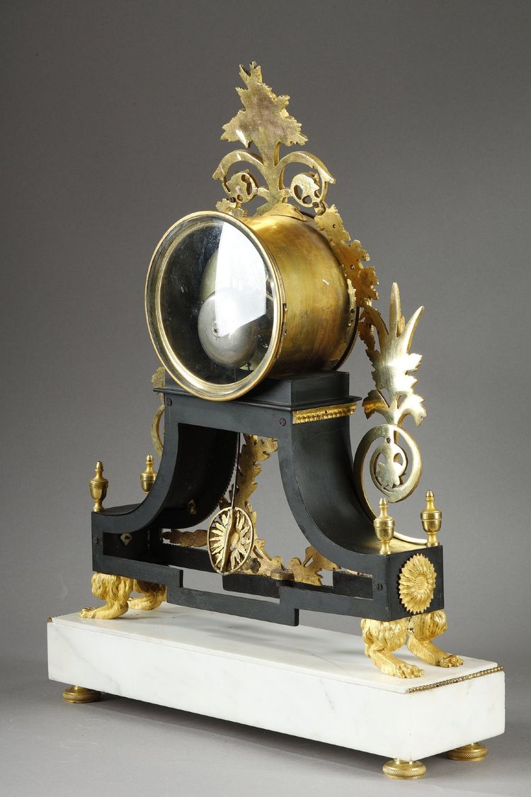 LARGE DIRECTOIRE CLOCK IN PATINATED AND GILT BRONZE
