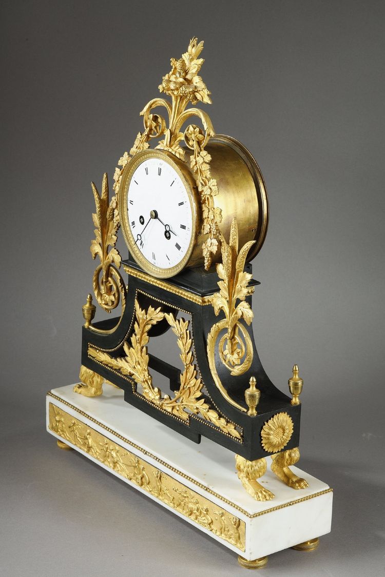 LARGE DIRECTOIRE CLOCK IN PATINATED AND GILT BRONZE