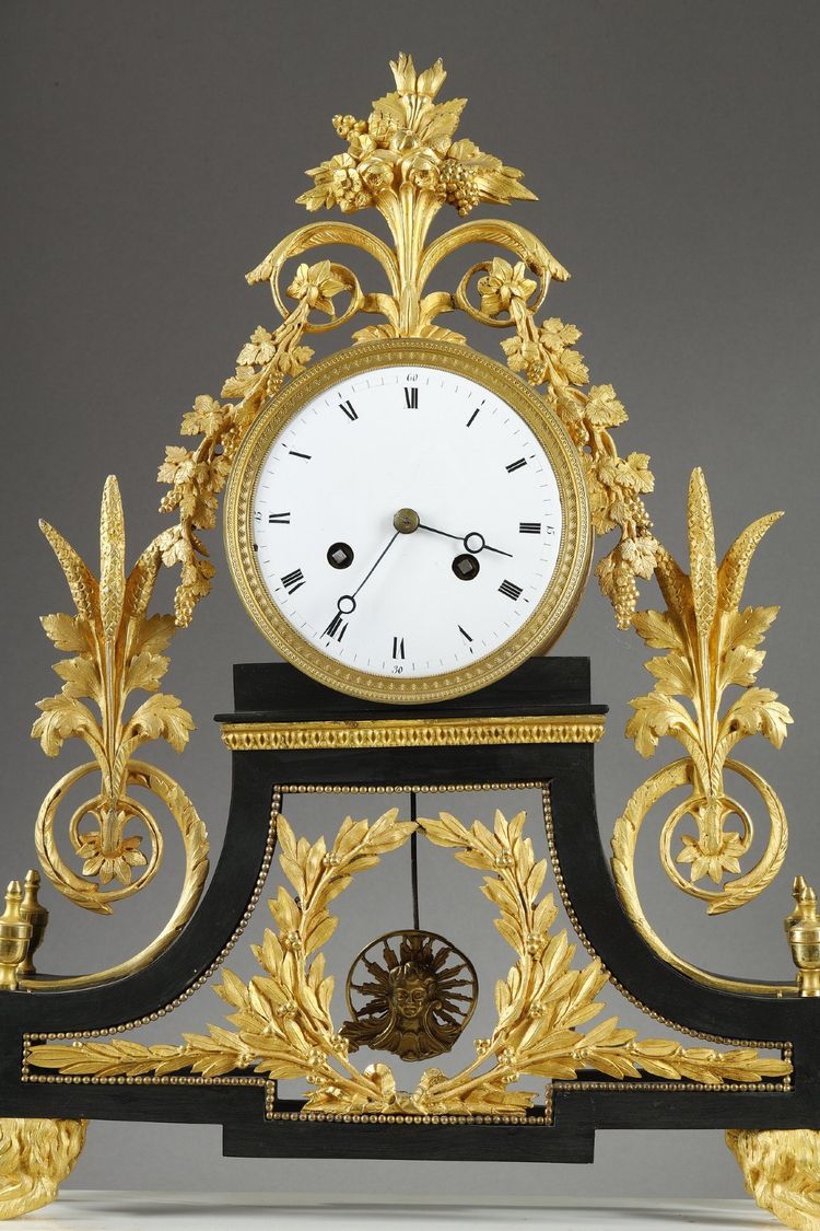 LARGE DIRECTOIRE CLOCK IN PATINATED AND GILT BRONZE