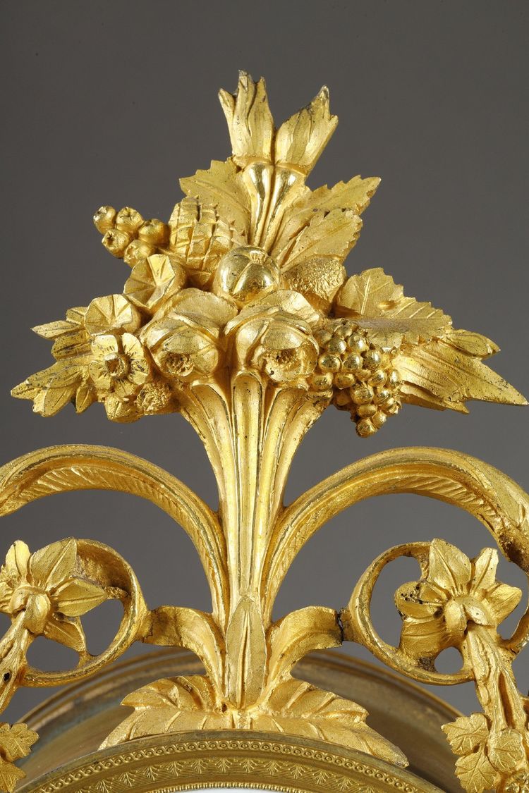 LARGE DIRECTOIRE CLOCK IN PATINATED AND GILT BRONZE